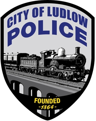 Emblem of the City of Ludlow Police featuring a steam locomotive and the text 