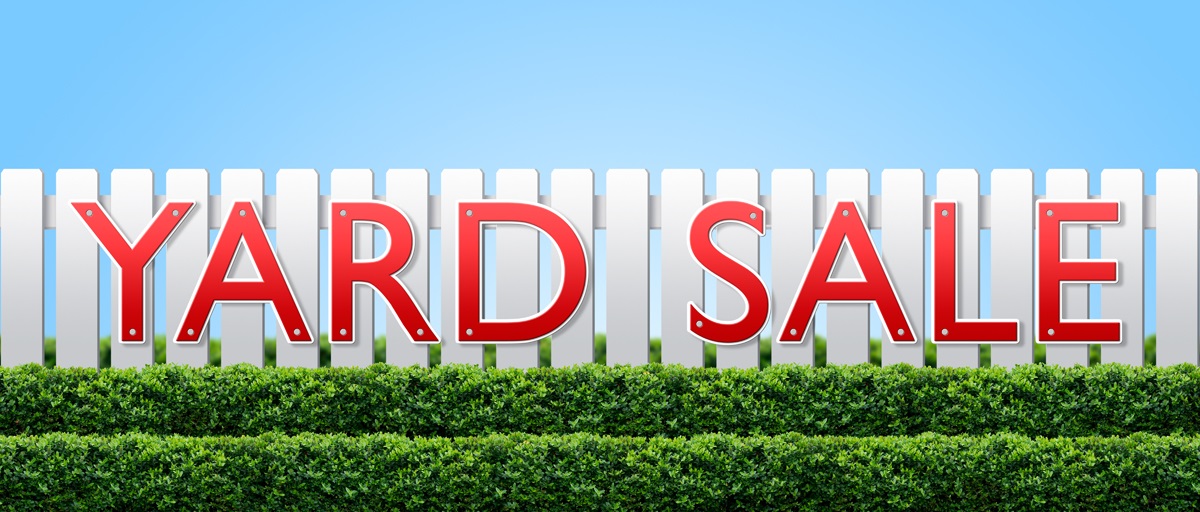 White fence with large red 