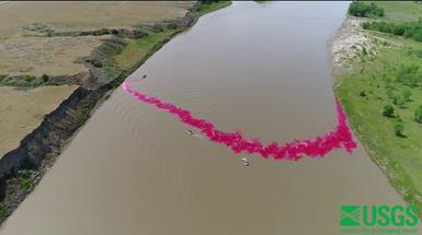 Photo shows SAMPLE of red dye river study (©USGS)